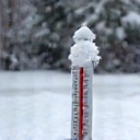 Icon representing snow temperature, like a thermometer in snow.